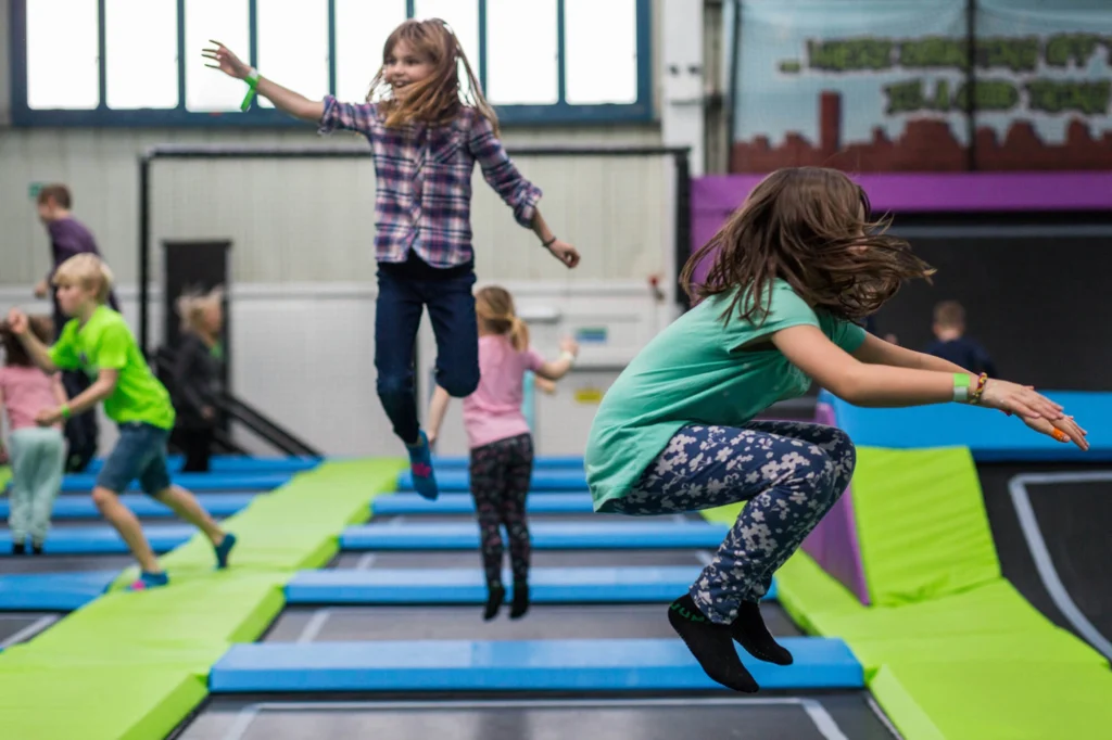 Girls playing on a trampoline